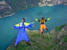 Douggs (camera) and Coombesy (RIP) make a brilliant team pushing the limits of human flight from the towering cliffs of Kjerag, Norway - Photo Mike Francis