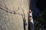 Crispin Waddy relaxing a 1000ft up El Capitan in Yosmite USA