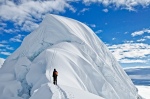 A climber below the summit mushroom of 6345m high Chopicalqui - Cordillera Blanca, Peru