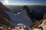 Will Sim on the lower reaches of the Freney Pillar at sunrise