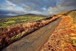 Sunlight bursts through below Fremington Edge Swaledale 