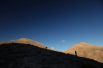 Carrying bags in The White Mountains, Crete at dusk